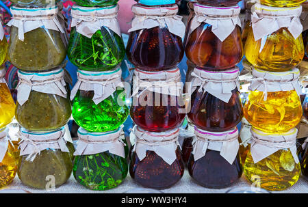 Jars of jam from various berries and fruits. Assortment of jams. Stock Photo