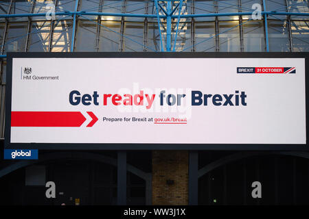 London, U.K. - September 10, 2019: An illuminated advert at Waterloo as part of the new government campaign calling for people to prepare for Brexit. Stock Photo