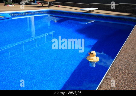 Empty private pool with toys from the last visitors Stock Photo