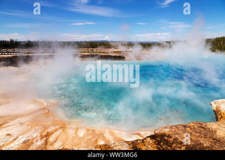 Steam rises from a pool at Grand Prismatic Spring in Yellowstone National Park. It is the largest hot spring at Yellowstone National Park with 200-330 Stock Photo