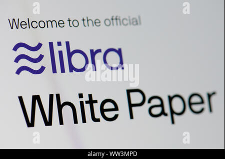 New york, USA - september 12, 2019: Watching facebook libra white paper on laptop screen close up view Stock Photo