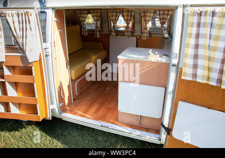 The Interior Of A Vintage Camper Van With A Vintage Picnic Basket Stock Photo Alamy