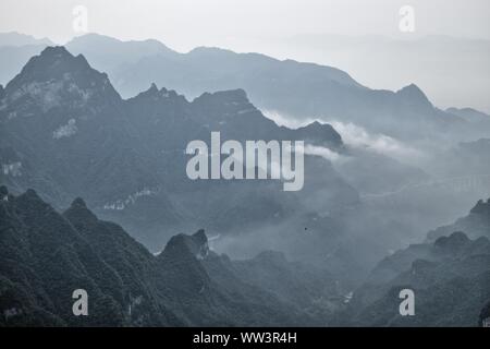 Tianmen Mountain, Heaven's Gate Mountain, is located within Tianmen Mountain National Park, Zhangjiajie, in Hunan province in China Stock Photo