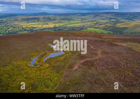 Aerial view over Long Mynd valley at bright summer day