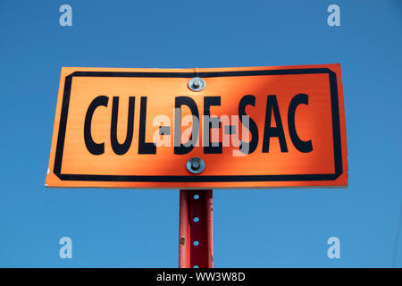 Cul-de-sac (dead end in French) construction road sign with a blue sky in background in Montréal, Québec, Canada Stock Photo