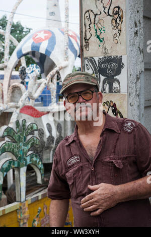 Portrait of Cuban artist José Rodríguez Fuster a well known Cuban artist outside of his home in Havana, Cuba Stock Photo