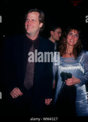 Jeff Daniels and wife Kathleen Rosemary Treado attending The Martian