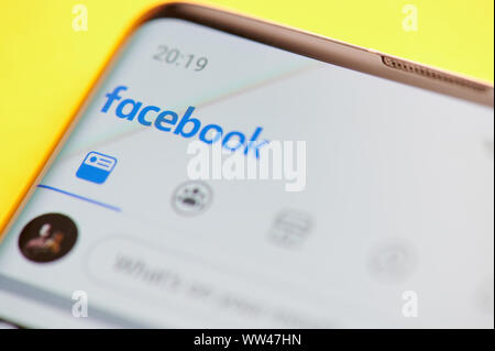 New york, USA - september 12, 2019: New interface of facebook app in smartphone screen close up view Stock Photo