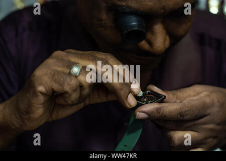 retro style watch manual repairing restoring timepiece fixing workshop Stock Photo