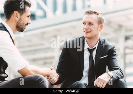 Business partner handshake happy smile positive deal Stock Photo