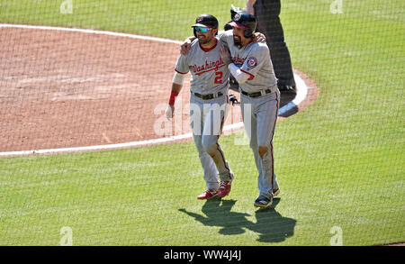 Atlanta, GA, USA. 08th Sep, 2019. Washington Nationals outfielder Adam Eaton (2) and infielder Anthony Rendon (right) celebrate after scoring runs during the seventh inning of a MLB game against the Atlanta Braves at SunTrust Park in Atlanta, GA. Austin McAfee/CSM/Alamy Live News Stock Photo