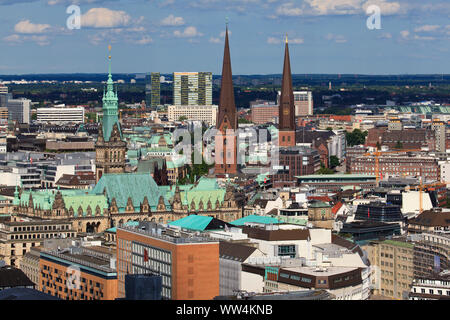View from Michel on the city of Hamburg with the towers of the St. Peter's church, St. Jakobi church and city hall in the district Hamburg old town. Stock Photo