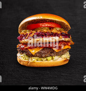 Fresh tasty burger on black background Stock Photo