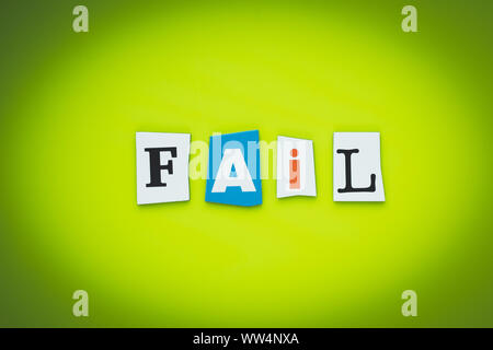 Single word - fail. Text on green background of multicolor letters. Message on bright poster. Headline on card. Colorful inscription on banner. Stock Photo
