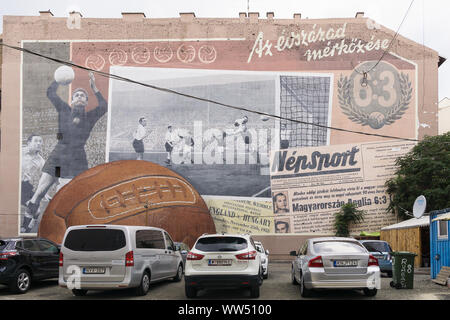 Mural "6:3" in the Jewish quarter of Budapest, celebrating the 1953 win of the Hungarian football team over England. Stock Photo