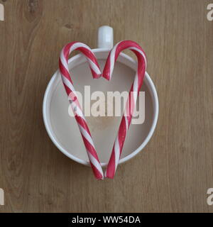 Christmas flat lay with coffee cup and candy cane Stock Photo
