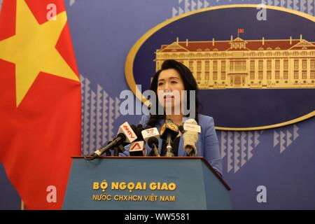 Hanoi, Vietnam. 12th Sep, 2019. Le Thi Thu Hang, spokesperson of the Vietnamese Ministry of Foreign Affairs, speaks at a press conference in Hanoi, capital of Vietnam, Sept. 12, 2019. Vietnam respects the 'one country, two systems' principle and relevant regulations, and hopes the situation in China's Hong Kong Special Administrative Region will return to normal soon, the spokesperson said on Thursday. She made the remarks when answering Xinhua's questions about the recent situation in Hong Kong. Credit: Wang Di/Xinhua/Alamy Live News Stock Photo