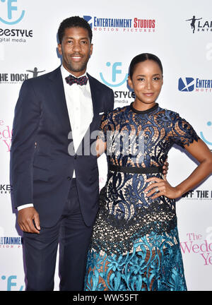 HOLLYWOOD, CA - SEPTEMBER 12: Fonzworth Bentley (L) and Faune Watkins attends the LA Premiere Of Entertainment Studios Motion Pictures' 'The Wedding Year' at ArcLight Hollywood on September 12, 2019 in Hollywood, California. Stock Photo