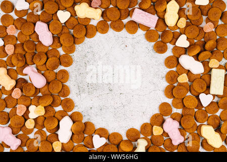 Dutch holiday Sinterklaas. Background with traditional food - pepernoten, chocolate letter, sweets strooigoed and carrots for horse. Concept for child Stock Photo