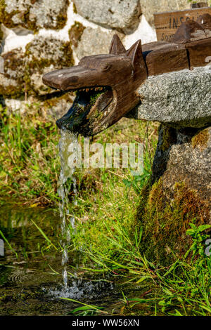 Fountain representing the Beast of Gevaudan, La Besseyre St Mary, Margeride, Haute-Loire department, Auvergne-Rhone-Alpes, France, Europe Stock Photo