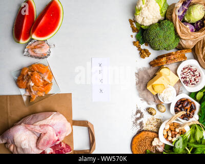 Foods High in Zinc as salmon, shrimps, beef, yellow cheese, spinach, mushrooms, cocoa, pumpkin seeds, garlic, bean and almonds. Top view Stock Photo