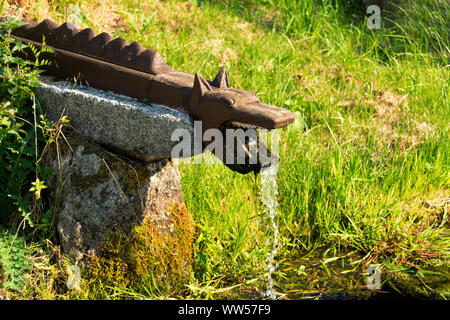 Fountain representing the Beast of Gevaudan, La Besseyre St Mary, Lozere, Occitanie, France, Europe Stock Photo