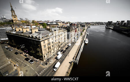 NEWCASTLE UPON TYNE, ENGLAND, UK - MAY 08, 2018: Looking down onto the Newcastle Quayside from the Tyne Bridge.