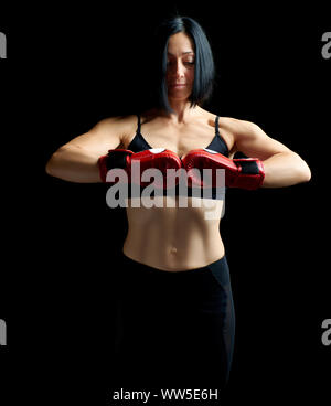 Beautiful woman wearing red bra doing winner gesture, say yes, looking so  happy Stock Photo - Alamy