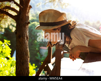 30-40 years old woman with straw hat on viewing platform in Krka National Park Stock Photo