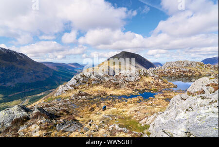 Views of the summit of High Crag and Ennerdale valley from the mountain summit of Hay Stacks in the English Lake District. Stock Photo