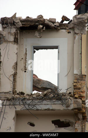 Photography of a demolition crane at work on a house, Stock Photo