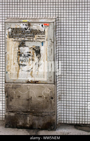 Junction box on a tiled wall with a drawing commemorating Florian P. on the 30th of March 2014 in Vienna, Stock Photo