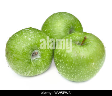 close on three beautiful and freshness green apples covered with water drops Stock Photo