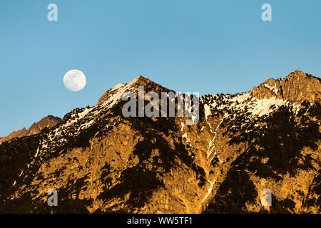 Moonrise above the Soiern group in the Karwendel Mountains of the Bavarian Alps, Germany. Stock Photo