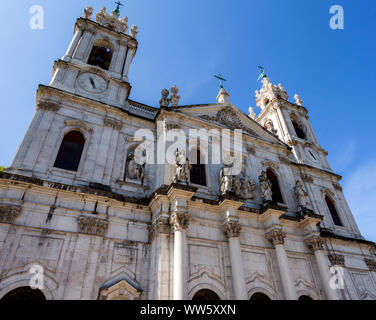 Facade of the late Baroque and Neo-Classical Royal Basilica and Convent of the Most Sacred Heart of Jesus, built in late 18th century in Lisbon, Portu Stock Photo