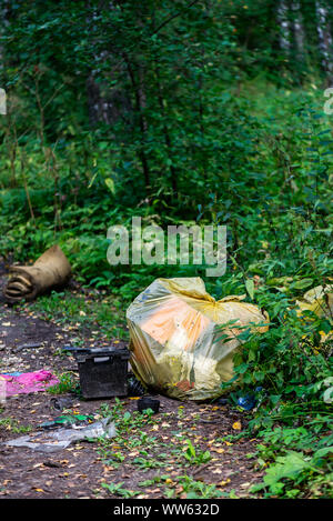 Big rubbish dump in the forest Stock Photo - Alamy