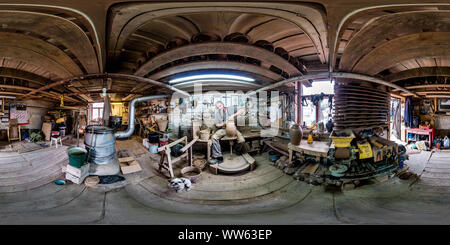 360 degree panoramic view of BIALYSTOK, POLAND - JULY 2019: Full spherical seamless hdri panorama 360 degrees angle view in interior of craftsman potter studio at work in equirect