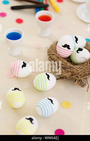 Easter nest, eggcup, dyeing and painting Easter eggs, Easter egg colour Stock Photo