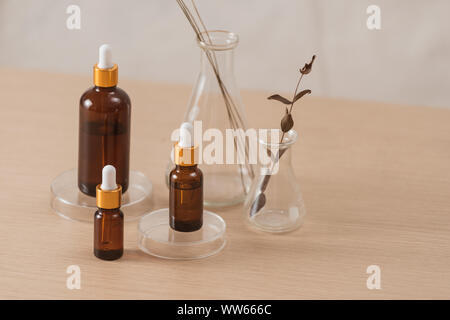 Cosmetic bottle stock images. Brown cosmetic bottle with batcher. Vials on a white background Stock Photo