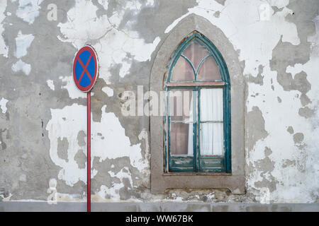 No parking sign on street, wall of a house, window, Gothic Stock Photo
