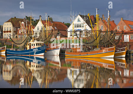 Morning at the shrimp boat harbour of Greetsiel in East Friesland. Stock Photo