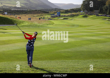 Solheim Cup, Gleneagles, UK. 13th Sep, 2019. The Solheim Cup started with 'foursomes' over the PGA Centenary Course at Gleneagles. MARINA ALEX, representing USA struck the first drive followed by BRONTE LAW representing Europe. Team Captains JULI INKSTER (USA) and CATRIONA MATTHEW (Europe) followed the team round the course. Morgan Pressel playing the third shot to the green on the second. Credit: Findlay/Alamy Live News Stock Photo