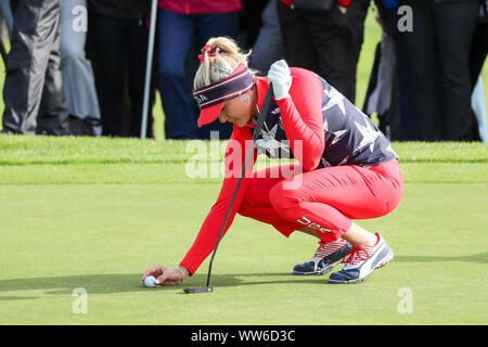 Solheim Cup, Gleneagles, UK. 13th Sep, 2019. The Solheim Cup started with 'foursomes' over the PGA Centenary Course at Gleneagles. MARINA ALEX, representing USA struck the first drive followed by BRONTE LAW representing Europe. Team Captains JULI INKSTER (USA) and CATRIONA MATTHEW (Europe) followed the team round the course. LEXI THOMSON lining up a putt. Credit: Findlay/Alamy Live News Stock Photo
