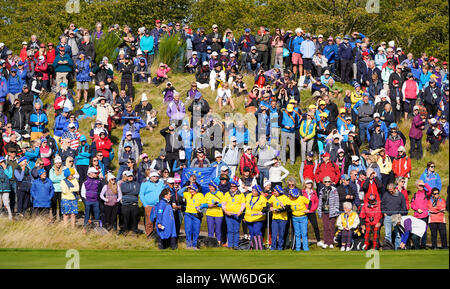 Auchterarder, Scotland, UK. 13 September 2019. Friday Foresomes matches on Friday Morning at 2019 Solheim Cup on Centenary Course at Gleneagles. Pictured; Crowds of spectators around the 10th green. Iain Masterton/Alamy Live News Stock Photo