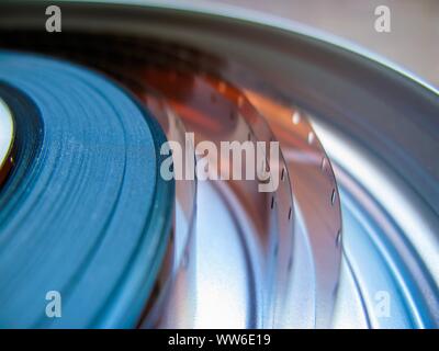 Roll of developed Super 16mm Film Negative on a Bobby in a can. 16mm Film is a popular and economical gauge of film stock.