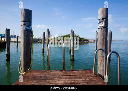 Swimming ban on the wooden dock in the lagoon of Venice Stock Photo
