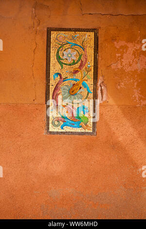 Mosaic panel on a house wall in Murano Stock Photo