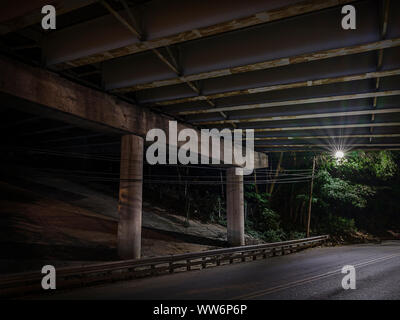 Lonely City Street Light Under Highway Overpass, Philadelphia USA Stock Photo