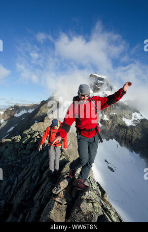 Climber on summit ridge of Parstleswand, Kaunergrat, Ã–tztaler Alps, Tyrol, Austria Stock Photo