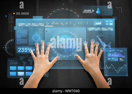 hand using black interactive panel with charts Stock Photo